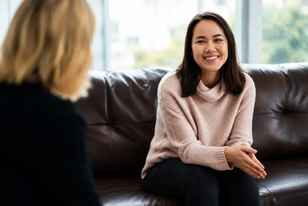 Patient speaking with a Spanish speaking psychiatrist during a one-on-one counseling session.